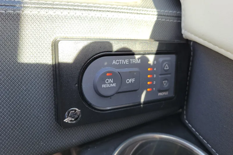 Slide: The Image of Active trim control panel in 2018 Monterey 278SS Super Sport boat interior. - 18