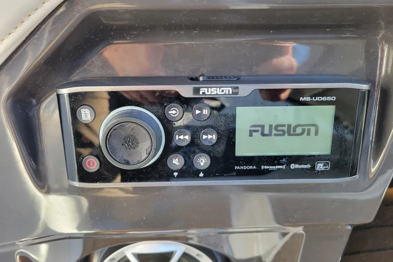 Slide: The Image of Fusion MS-UD650 stereo system on 2018 Monterey 278SS Super Sport boat dashboard. - 21