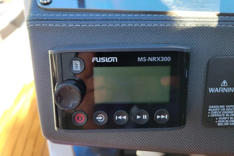 Slide: The Image of Fusion MS-NRX300 stereo system on 2018 Monterey 278SS Super Sport boat dashboard. - 22