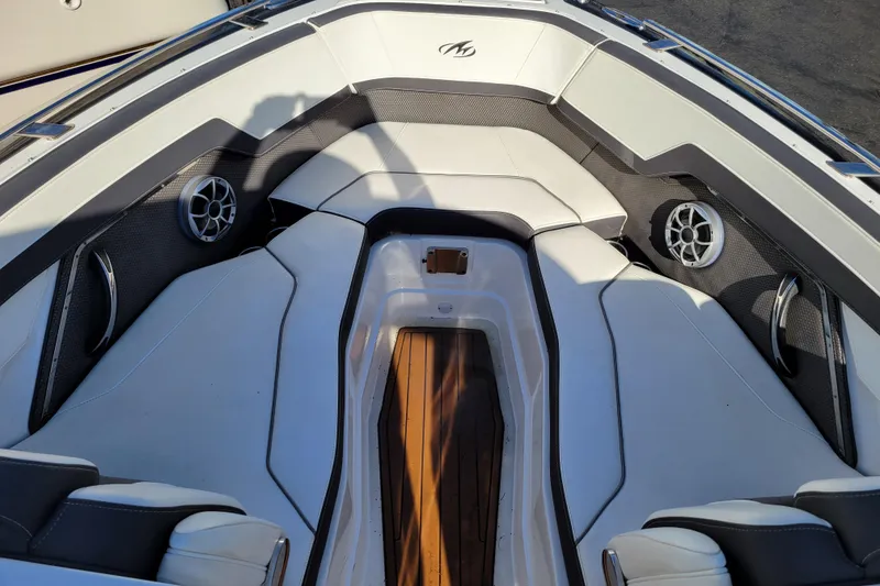 Slide: The Image of 2018 Monterey 278SS Super Sport boat interior with sleek seating and modern speakers. - 27