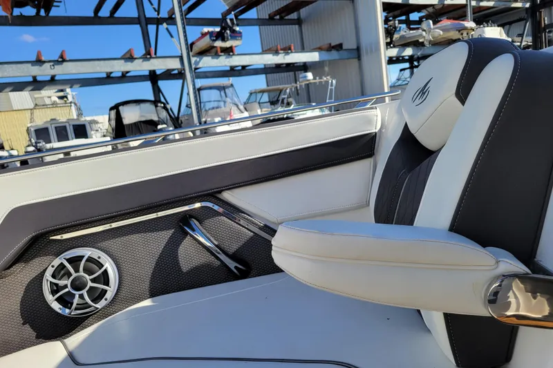 Slide: The Image of Interior of 2018 Monterey 278SS Super Sport boat with sleek seating and speaker detail. - 29