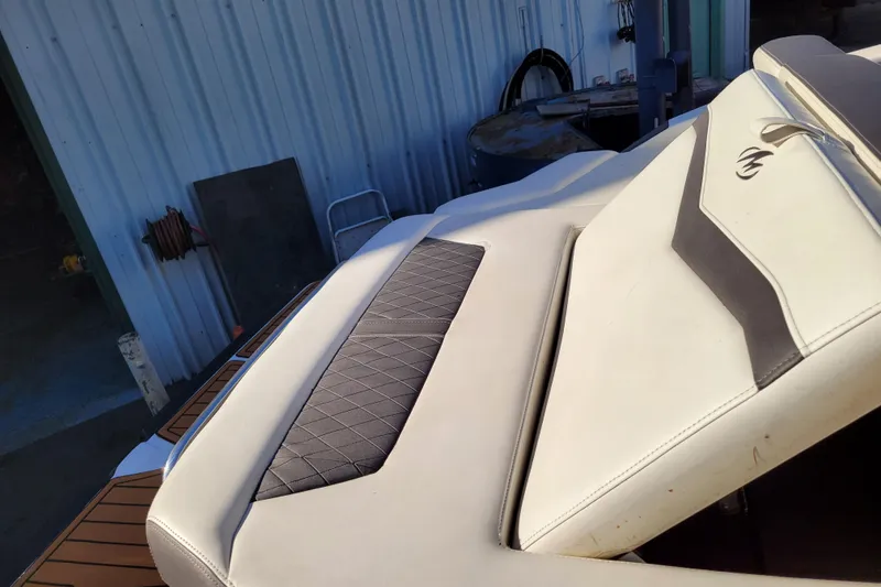 Slide: The Image of 2018 Monterey 278SS Super Sport boat interior with cushioned seating and sleek design. - 33