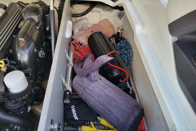 Slide: The Image of Storage compartment of 2018 Monterey 278SS Super Sport boat with engine and accessories. - 37