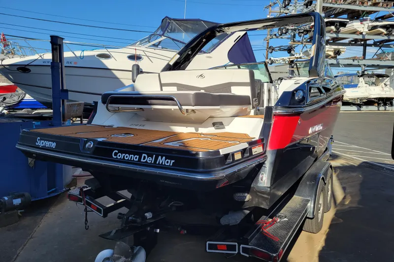 Slide: The Image of 2018 Monterey 278SS Super Sport boat on trailer at marina, rear view. - 5