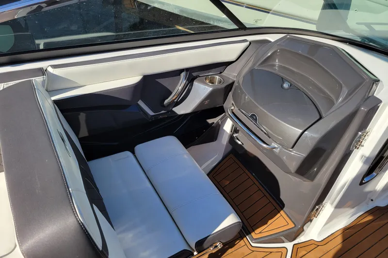 Slide: The Image of Interior of a 2018 Monterey 278SS Super Sport boat, featuring sleek seating and modern design. - 9