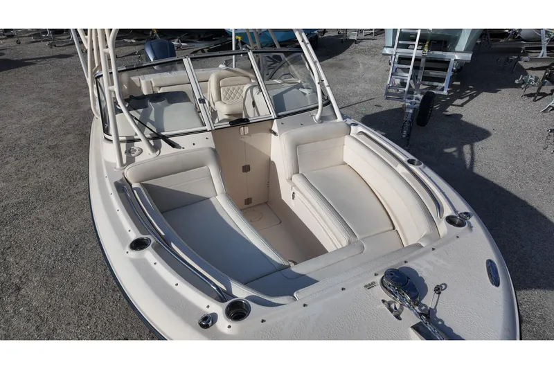 Slide: The Image of 2019 Grady-White Freedom 235 boat with spacious seating and sleek design. - 14