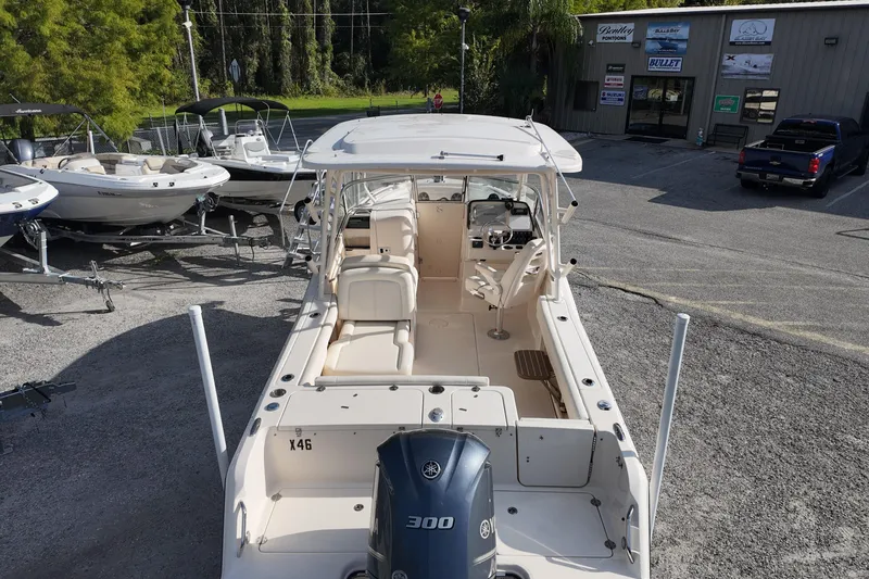 Slide: The Image of 2019 Grady-White Freedom 235 boat with Yamaha 300 engine, parked at dealership. - 9