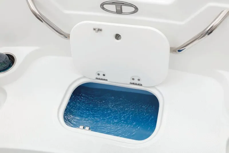 Slide: The Image of Open storage compartment on a 2021 Tahoe 1950 boat. - 20