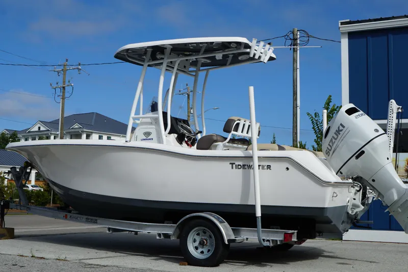 Slide: The Image of 2019 Tidewater 210 LXF boat on trailer with Suzuki outboard motor. - 4