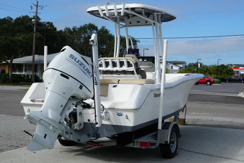 Slide: The Image of 2019 Tidewater 210 LXF boat with Suzuki outboard motor on trailer. - 6
