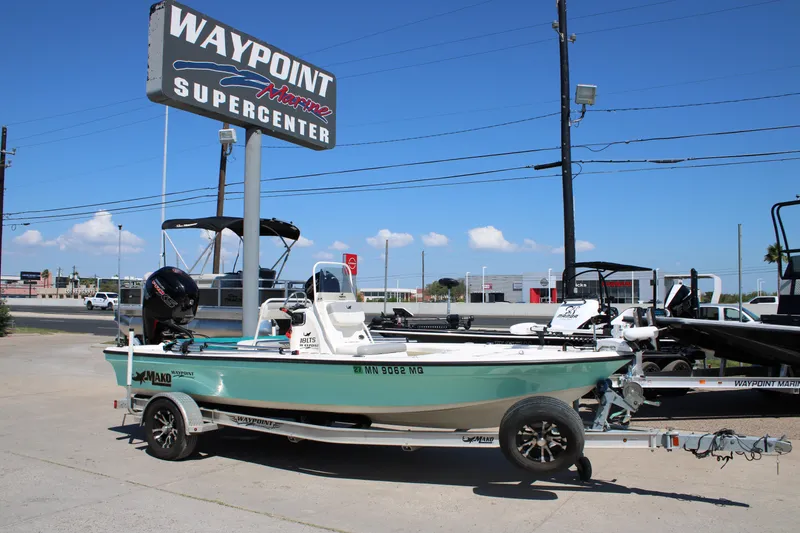 Slide: The Image of 2022 Mako 18 LTS boat on trailer at Waypoint Marine Supercenter. - 12