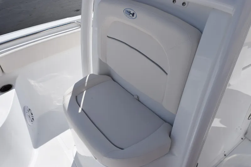 Slide: The Image of 2026 Sea Hunt Ultra 229 boat seat, white upholstery, sleek design. - 13