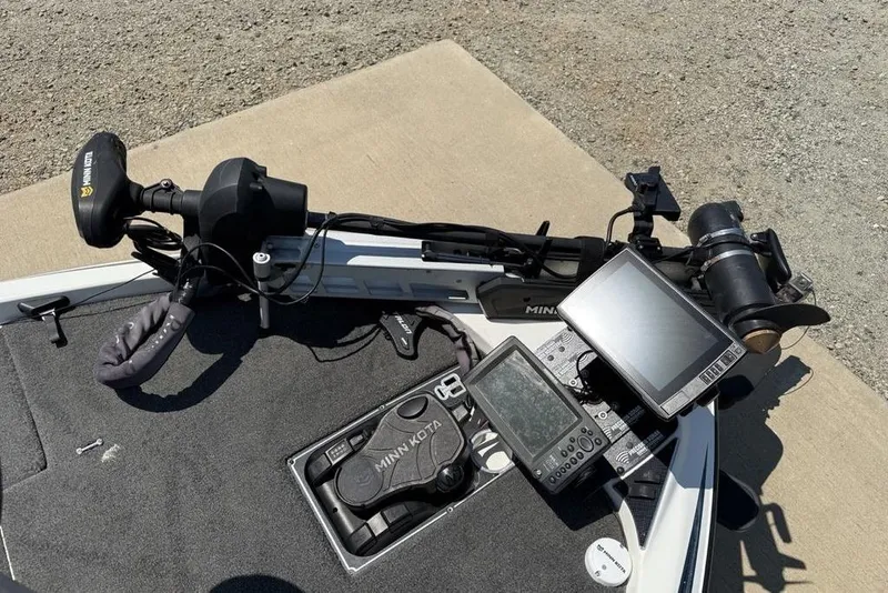 Slide: The Image of Foot pedal control on 2014 Skeeter FX20 boat, featuring Minn Kota branding. - 8