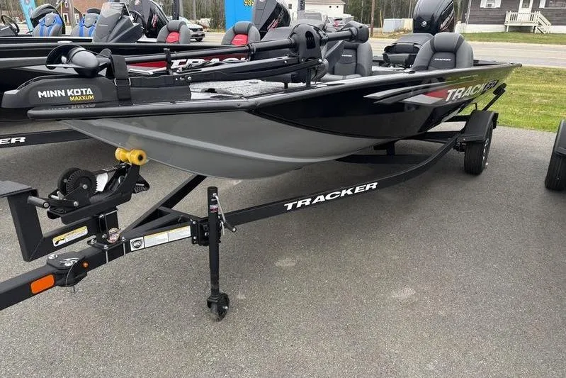 Slide: The Image of 2026 Tracker Pro Team 175 boat on trailer, featuring Minn Kota Maxxum motor. - 6