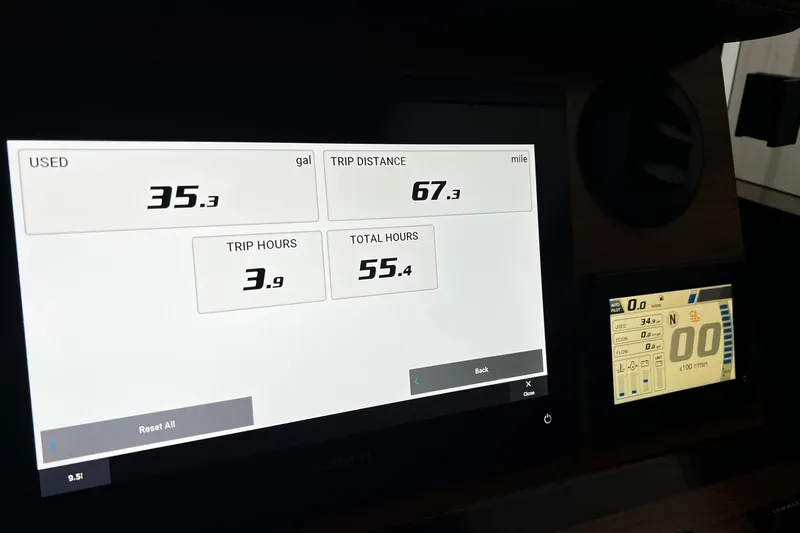 Slide: The Image of Dashboard of 2025 Ranger Tugs R-27 showing fuel usage and trip data. - 32