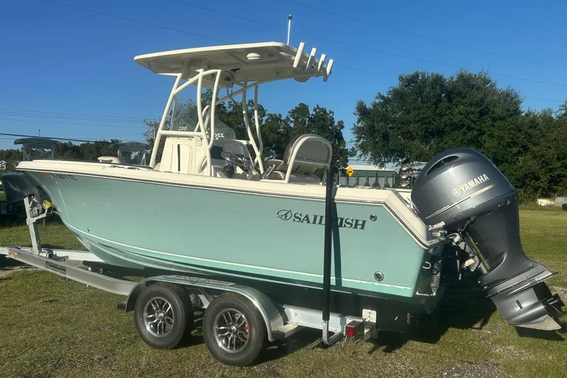 Slide: The Image of 2023 Sailfish 220 CC boat on trailer with Yamaha outboard motor. - 3