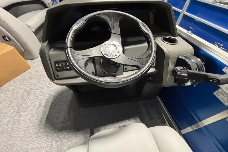 Slide: The Image of Steering console of 2026 Sun Tracker Party Barge 18 DLX pontoon boat. - 6