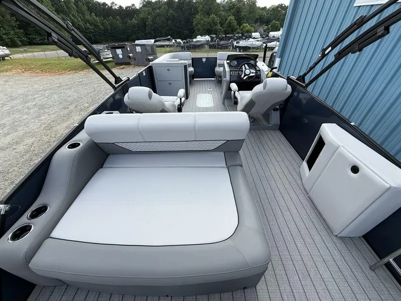 Slide: The Image of 2025 Godfrey Monaco 235 SFL iMPACT pontoon boat interior with spacious seating and modern design. - 24