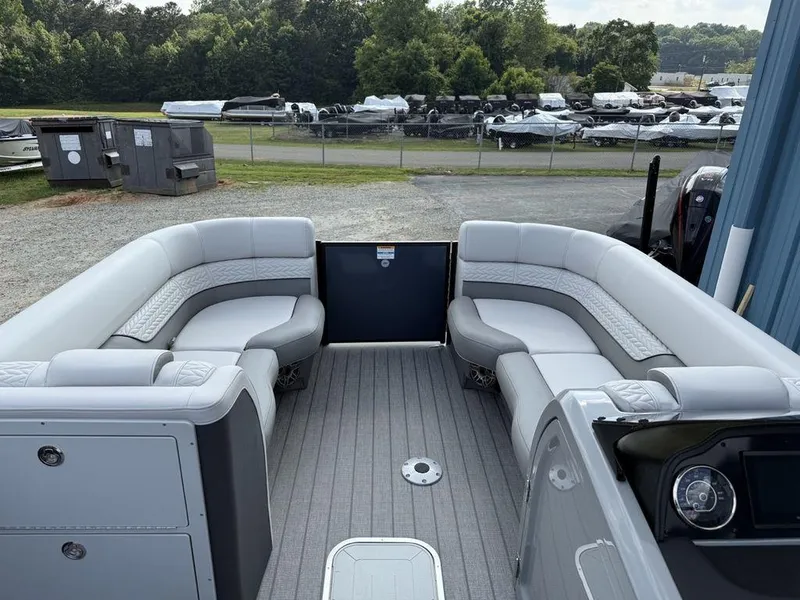 Slide: The Image of 2025 Godfrey Monaco 235 SFL iMPACT boat interior with luxurious seating and modern design. - 5