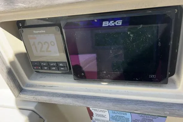 Slide: The Image of Navigation instruments on a 1977 Islander 36 sailboat dashboard. - 14