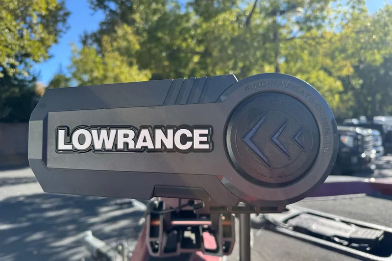 Slide: The Image of Lowrance device on 2016 Ranger RT178 boat, surrounded by trees and parked vehicles. - 12