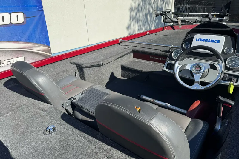 Slide: The Image of 2016 Ranger RT178 boat interior with steering wheel and Lowrance electronics. - 6
