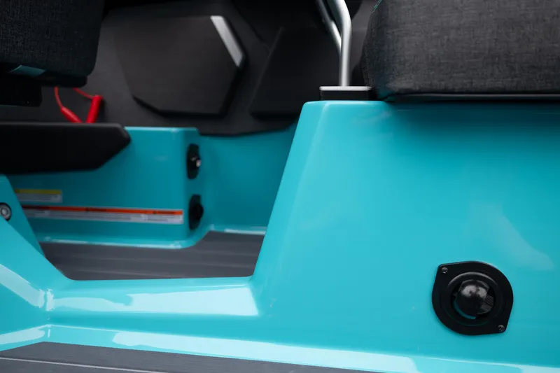 Slide: The Image of Interior of 2026 MasterCraft X24 boat with turquoise detailing and modern design. - 23