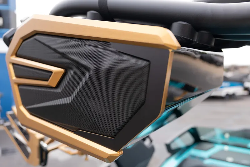Slide: The Image of Close-up of 2026 MasterCraft X24 boat speaker with gold accents. - 55