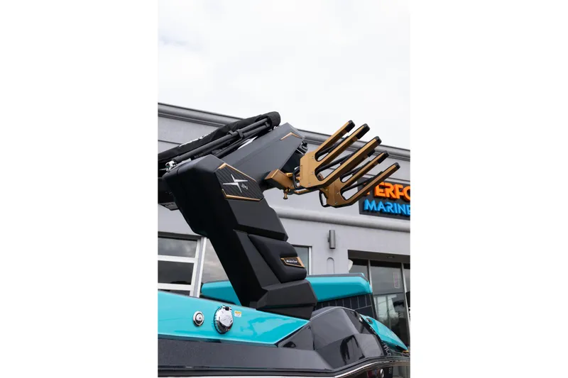 Slide: The Image of 2026 MasterCraft X24 boat with sleek design and advanced wakeboard rack. - 67