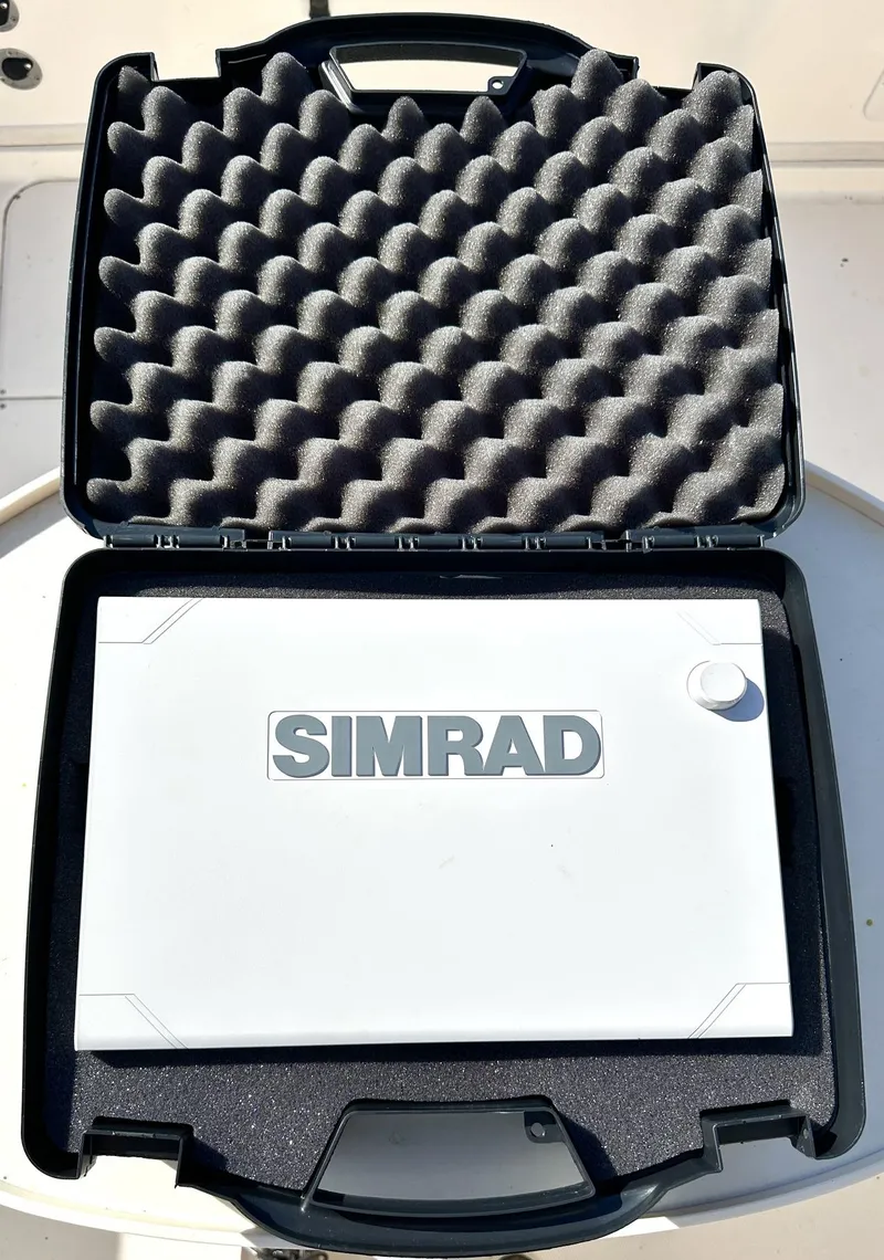 Slide: The Image of Simrad marine equipment in protective case, compatible with 2003 Grady-White Marlin 300. - 12