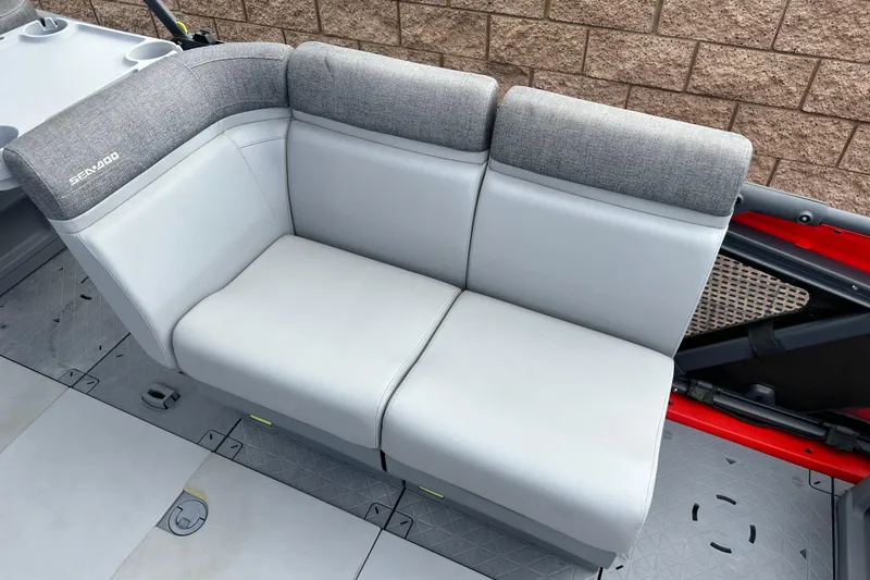 Slide: The Image of 2023 Sea-Doo Switch Cruise 18 dashboard with Garmin navigation system and controls. - 15