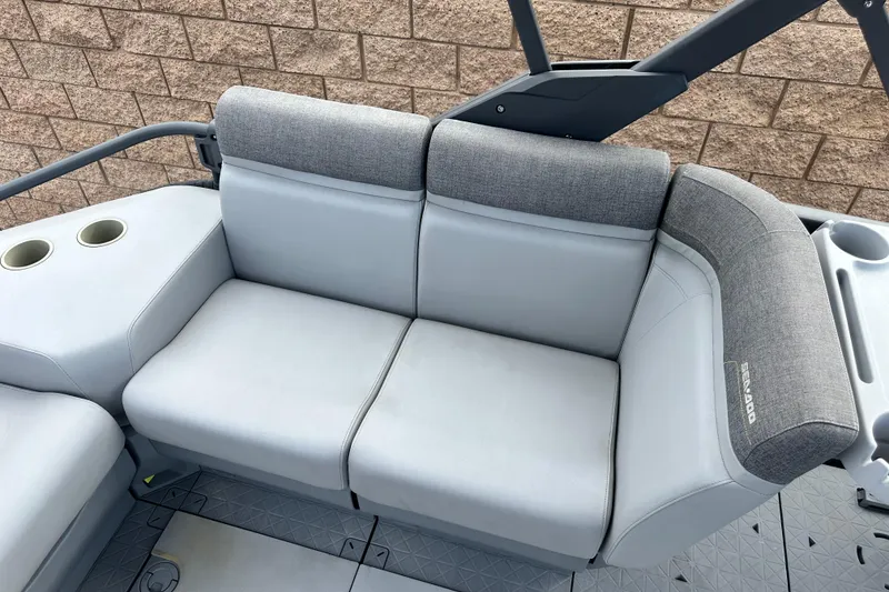 Slide: The Image of 2023 Sea-Doo Switch Cruise 18 audio control panel on dashboard. - 17