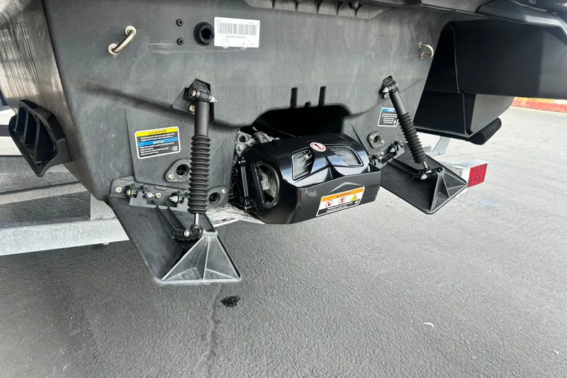 Slide: The Image of 2023 Sea-Doo Switch Cruise 18 rear view, showcasing suspension and propulsion system. - 6