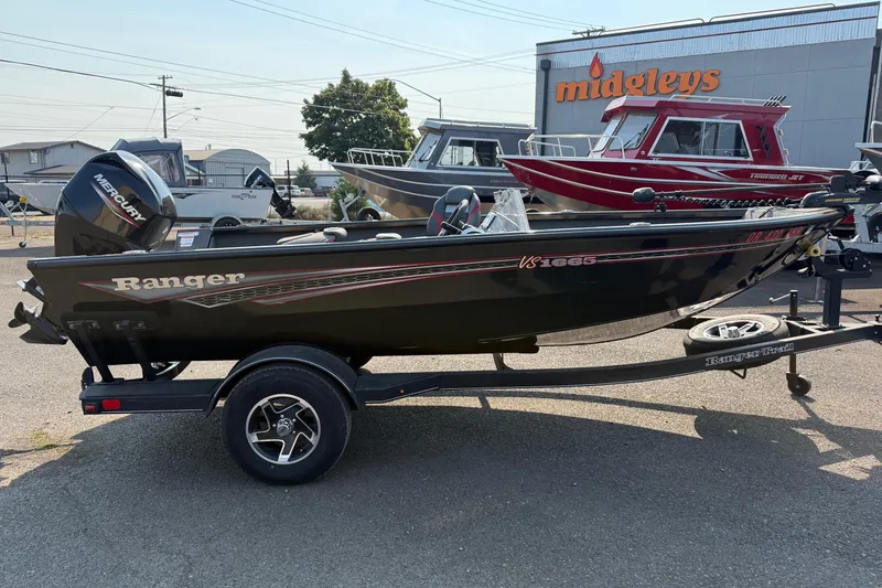 Slide: The Image of 2023 Ranger VS1665SC boat on trailer at dealership, side view. - 4