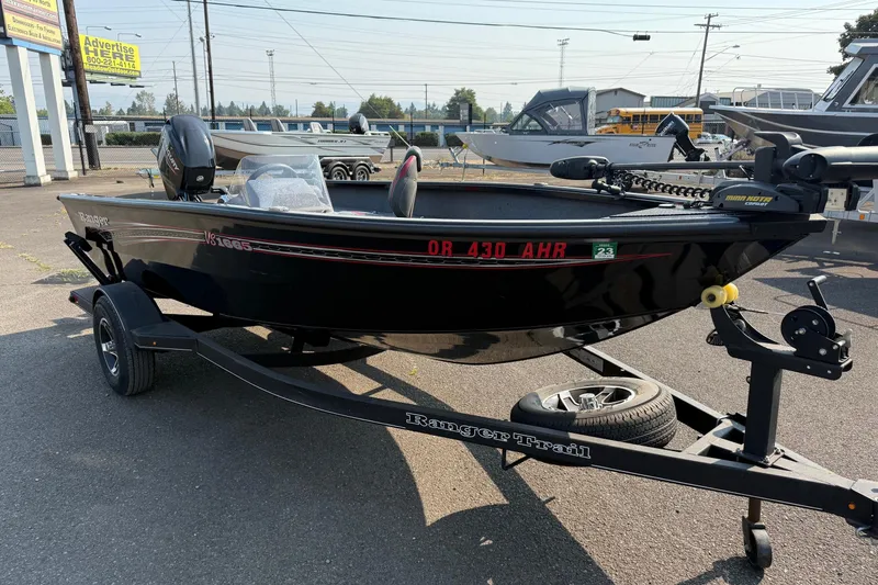 Slide: The Image of 2023 Ranger VS1665SC fishing boat on trailer, parked outdoors. - 5