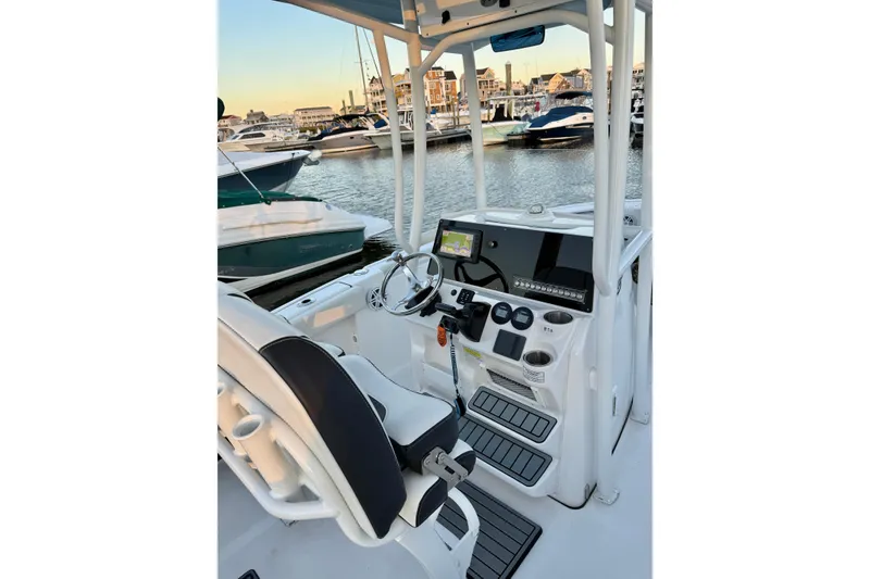 Slide: The Image of 2021 Tidewater 210 LXF boat on trailer with Yamaha outboard motor. - 2