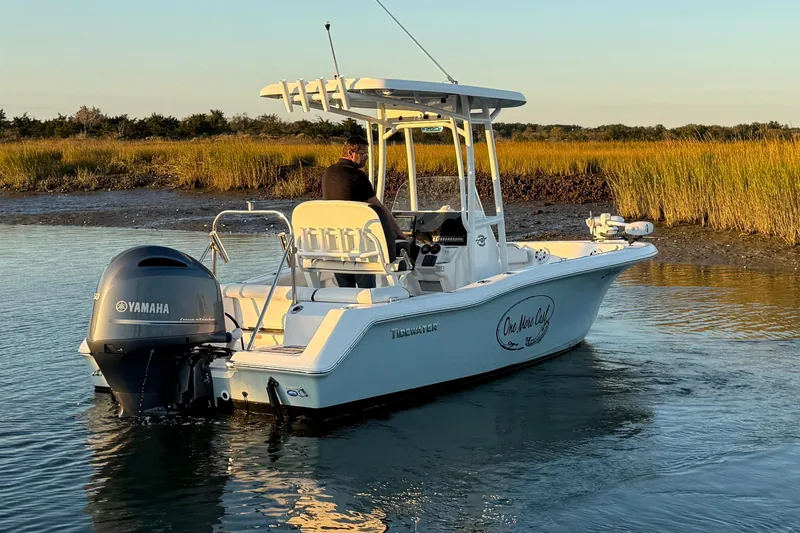 Slide: The Image of 2021 Tidewater 210 LXF boat with Yamaha outboard motor on trailer. - 3