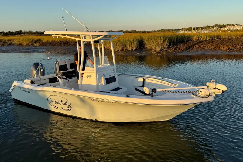 Slide: The Image of 2021 Tidewater 210 LXF boat with Yamaha engine on calm water. - 9