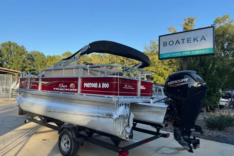 Slide: The Image of 2022 Sun Tracker Bass Buggy 18 DLX pontoon boat with Mercury engine at Boateka dealership. - 2