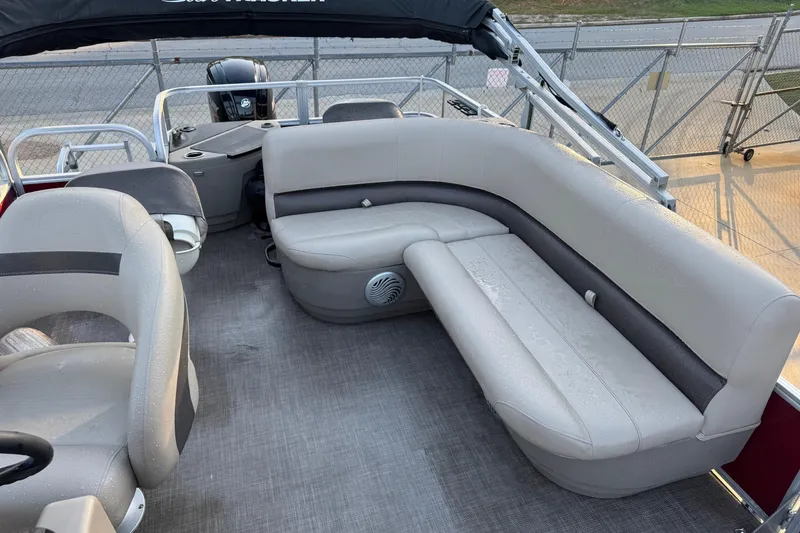 Slide: The Image of 2022 Sun Tracker Bass Buggy 18 DLX pontoon boat with spacious seating and modern design. - 6
