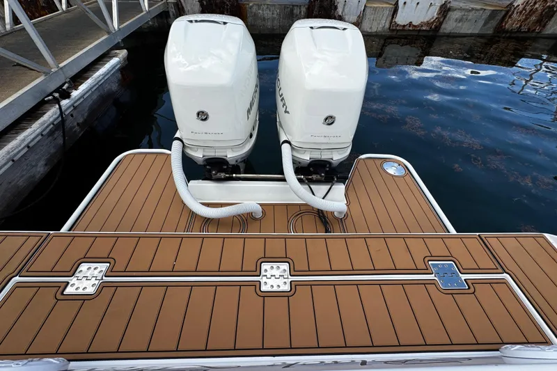 Slide: The Image of 2008 Seaswirl Striper 2901 Walkaround O/B with twin Mercury outboard engines at dock. - 13