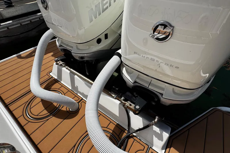 Slide: The Image of 2008 Seaswirl Striper 2901 Walkaround O/B with twin outboard motors on teak deck. - 19