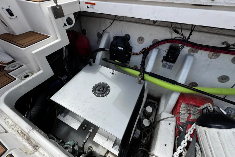 Slide: The Image of 2008 Seaswirl Striper 2901 Walkaround O/B engine compartment with wiring and equipment. - 22