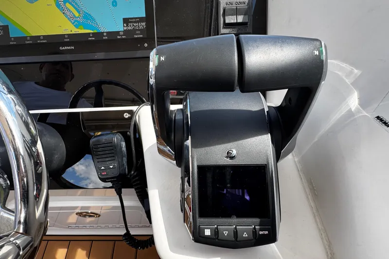Slide: The Image of Control panel of 2008 Seaswirl Striper 2901 Walkaround O/B with Garmin navigation display. - 34