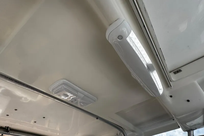Slide: The Image of Ceiling lights inside a 2008 Seaswirl Striper 2901 Walkaround O/B boat. - 49