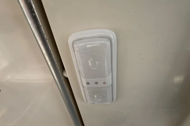 Slide: The Image of Interior light switch on 2008 Seaswirl Striper 2901 Walkaround O/B boat. - 50