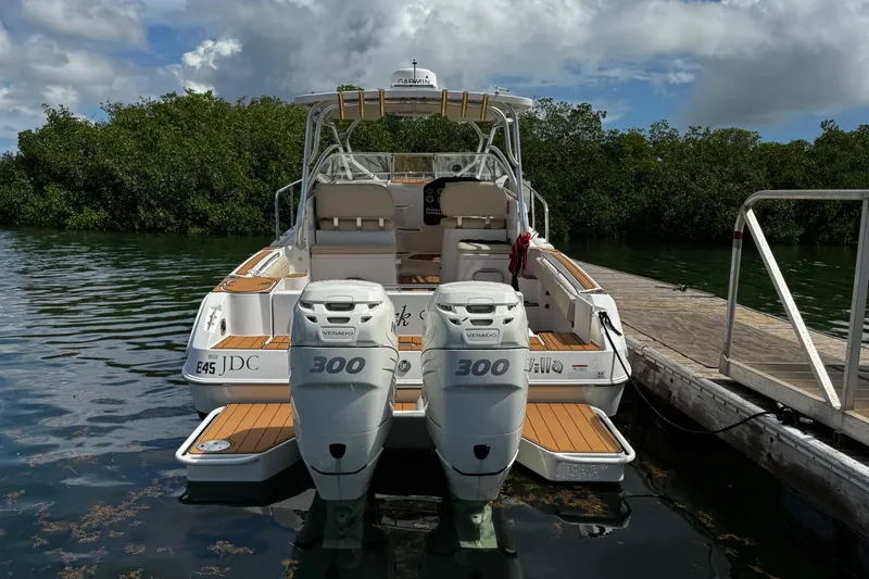 Slide: The Image of 2008 Seaswirl Striper 2901 Walkaround O/B docked with twin 300 Verado engines. - 7
