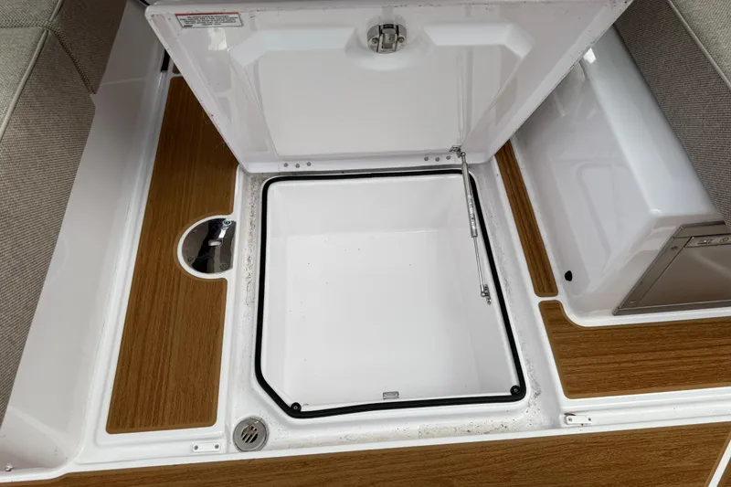 Slide: The Image of Close-up of JL Audio speaker on 2024 Axopar 37 Sun Top boat interior. - 36