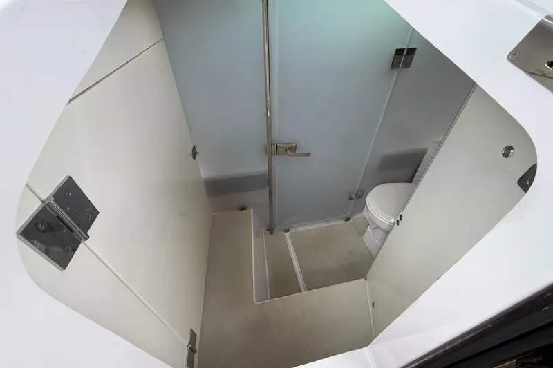 Slide: The Image of 2024 Axopar 37 Sun Top helm with modern controls and sleek design. - 42