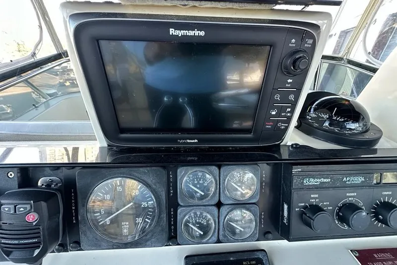 Slide: The Image of Bathroom interior of 1988 Hatteras 48 Convertible yacht with shower and toilet. - 29